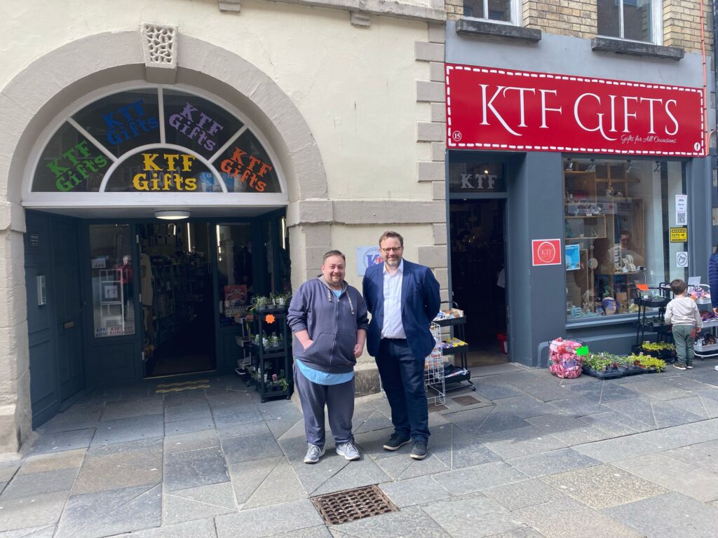 Photo of Chris Elmore MP and Daniel Cassar outside KTF Gifts in Bridgend.